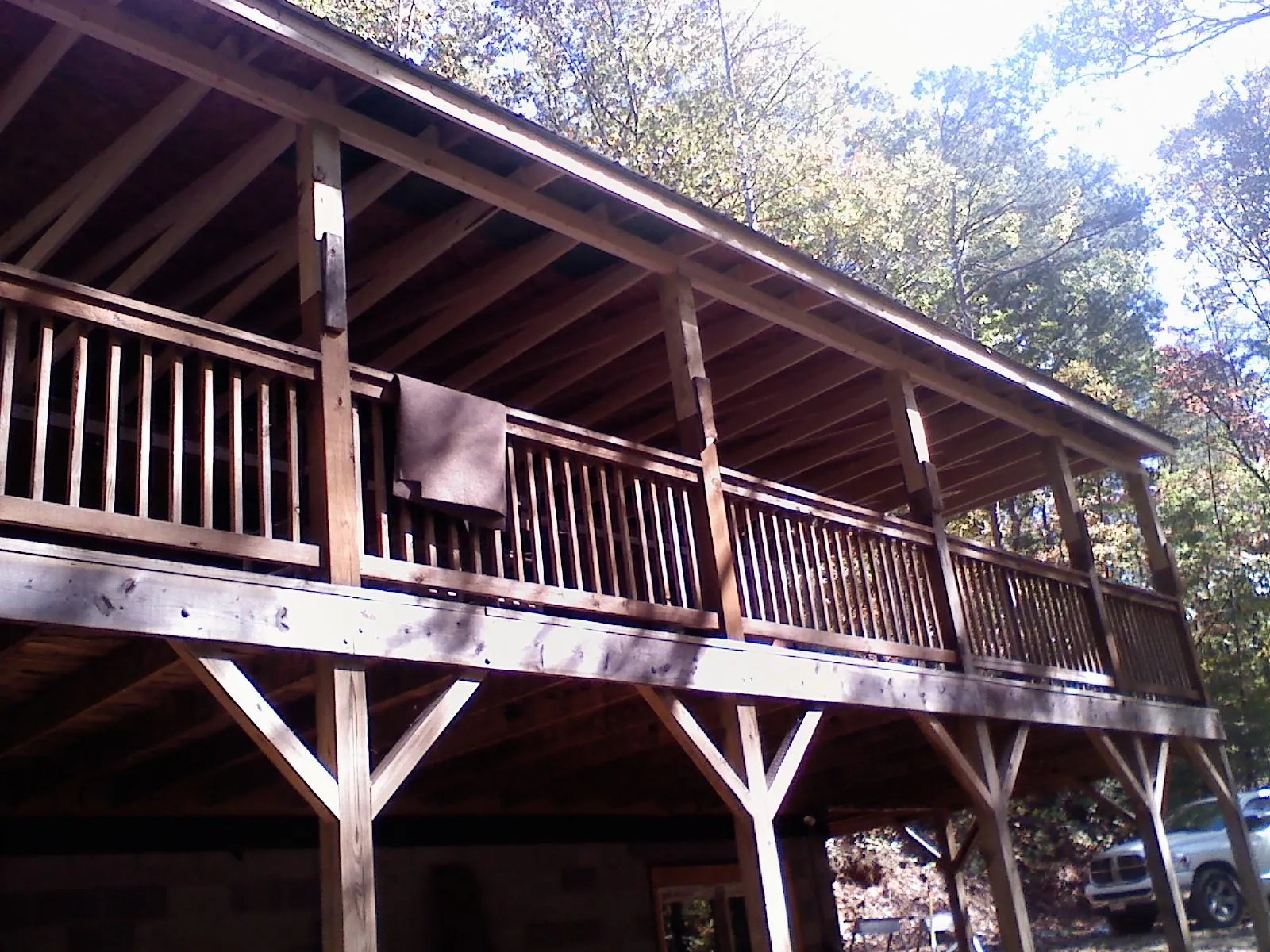 Timber framing under a new elevated porch and deck — Roof Leak Repair in Algonac by Roofing Brothers